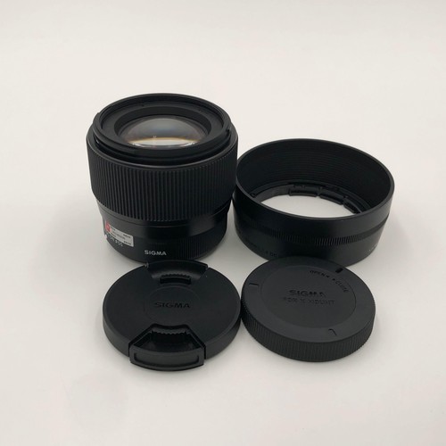 Sigma 56mm dc - 56mm, f/1.4