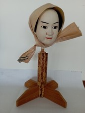 Bambola cinese in porcellana