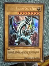 drago bianco occhi blu prima