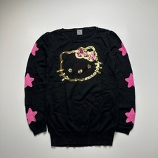 Maglione nero con paillettes