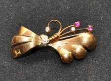Spilla donna fiocco Oro 750 18