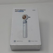 Fotocamera auricolare