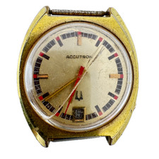 Orologio da polso uomo vintage 35 mm Accutron quadrante oro e data forcella tuning 218 D USA