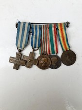 5 medaglie mignon Italia 1 guerra mondiale montate su spilla.