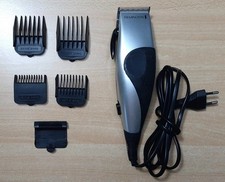 Remington Tagliacapelli con Lama in Acciaio Inox + 4 Pettini e 1 Copri Lama