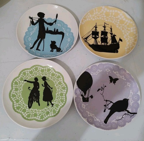 Set quattro piatti - quattro, fantasia