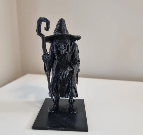 Statuina strega - la,