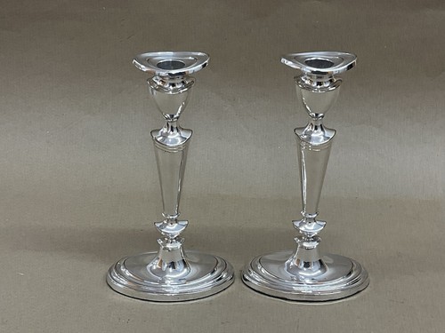 Coppia candelabri placcati - di,