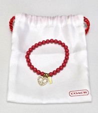 COACH Coral Red Tone Stone