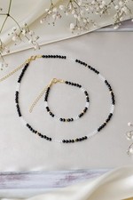 Collana di perle con pietre