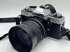 Minolta XG-1 con zoom MD