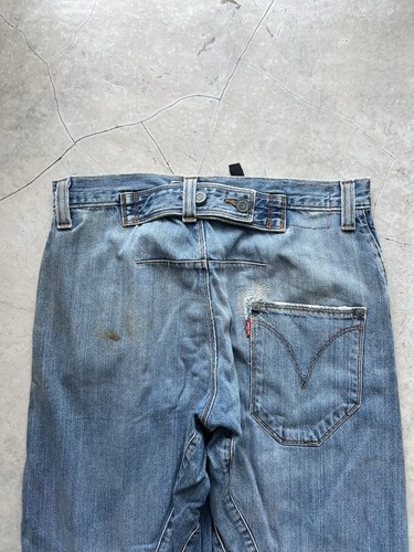 Fibbia jeans intrecciata