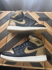 Jordan 1 retrò nero e oro
