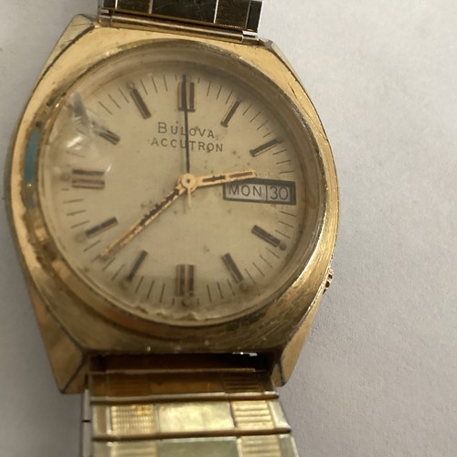 Bulova accutron gold finish - bulova,