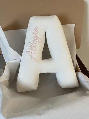 Cuscino forma lettera - di, con