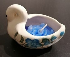Stock candele cigno profumate in ceramica aroma ocean