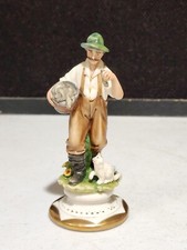 FIGURINA UOMO CON PESCE E