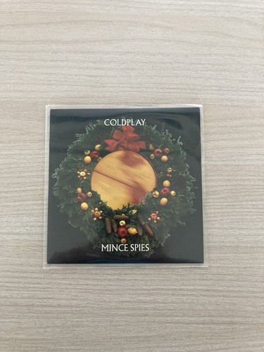 Coldplay mince spies - -,