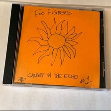 FOO FIGHTERS cd CAUGHT IN THE