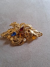 Vintage gold tone brooch with - tone,