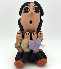 Narratore + Quattro bambini dell'artista indiano/navajo del sud-ovest Geneve Bitoni