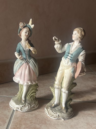 Coppia statuine in - coppia,