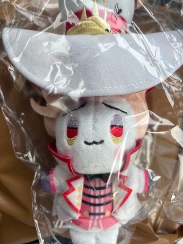 Mascotte bambola peluche
