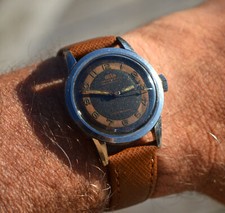 A VERY RARE ARSA CALATRAVA STAINLESS STEEL VINTAGE DRESS WATCH TUTONE DIAL