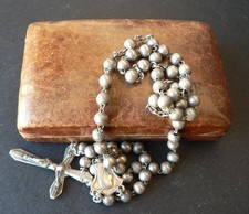 Antico rosario in metallo