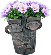 Fioriera Con Viso Astratto