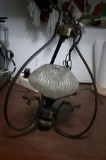 lampadario metallo e coppa in