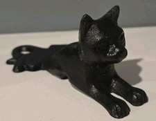 Fermaporta in ghisa vecchio