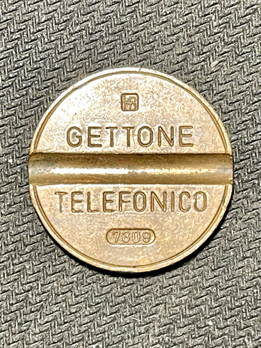 Gettone telefonico serie - telefonico, 7309