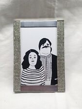 cornice con bordi di strass