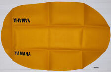 Housse de selle jaune orange