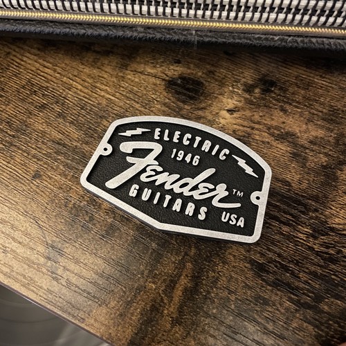 Distintivo logo chitarra