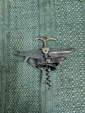 ANTICO CAVATAPPI IN FERRO  A MOLLA ORIGINALE DEI PRIMI ANNI DEL 1900