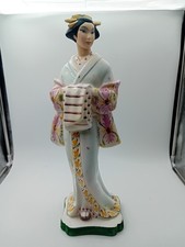 statua giapponese ceramica