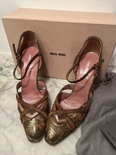Miu Miu oro/glitter tacco