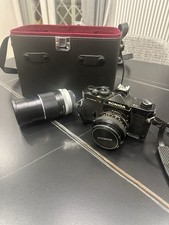 Konica Autoreflex T3 fotocamera + obiettivo Panagor