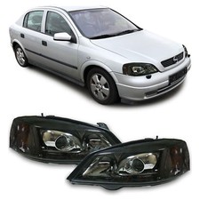 FARI ANTERIORI SCURO PER OPEL