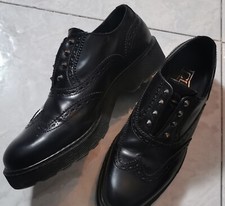 Scarpe Cult borchiate limited edition indossate una volta numero 42