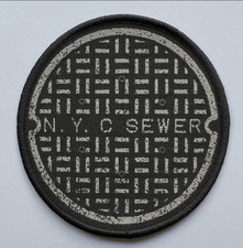 Nyc fower pohole cover toppa - pohole,