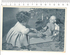 girl with celluloid doll 1957