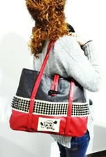 Borsa artigianale nera e bordeaux con borchie