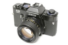 Revue AM Quartz con obiettivo