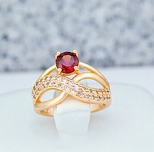 Anello donna granato rosso oro