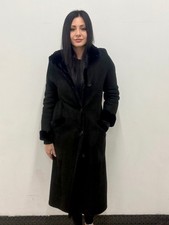 Cappotto in shearling nero con