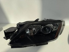 Faro allo xeno sinistro Mazda