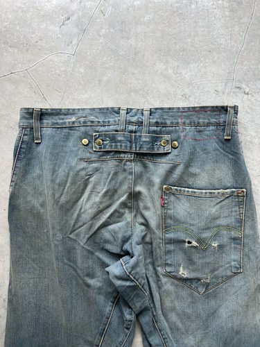 Fibbia jeans intrecciata